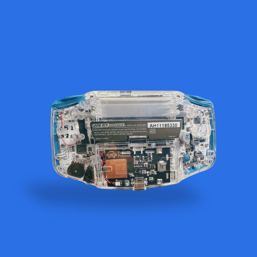 Game Boy Advance with transparent casing and FunnyPlaying back shell